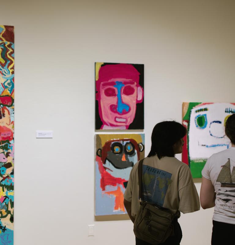 People looking at art