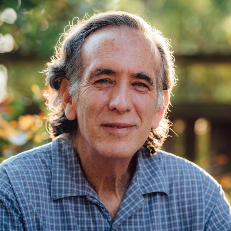 Michael Schwager headshot in front of Trees
