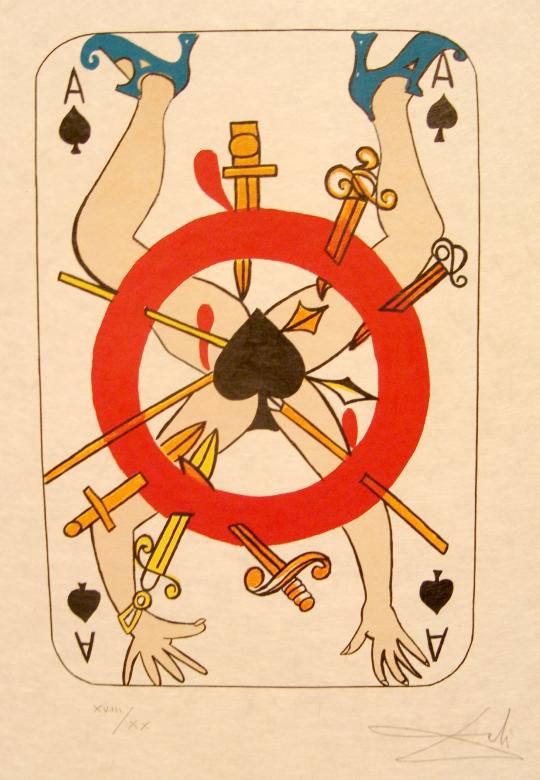 A surreal illustration resembling a playing card. At the center, a red circle encloses a black spade symbol, surrounded by various disjointed human limbs and objects, including legs in high heels and hands holding tools or weapons, arranged in a chaotic wheel-like pattern.