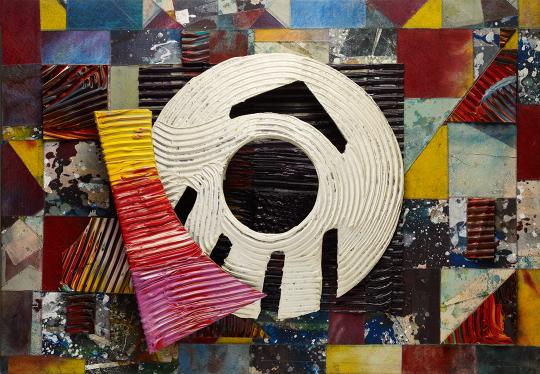 Abstract mixed-media artwork featuring a collage of colorful geometric shapes in red, yellow, blue, and maroon tones. At the center is a large white circular form with black angular markings resembling an eye or target. The piece combines layered textures and dynamic color contrasts, creating a sense of rhythm and motion